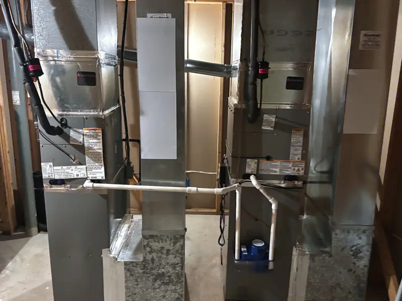 Twin air handlers and ductwork installed by Edge Mechanical in Bucks County